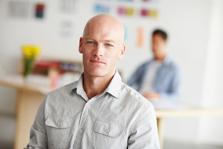 Young man with no hair