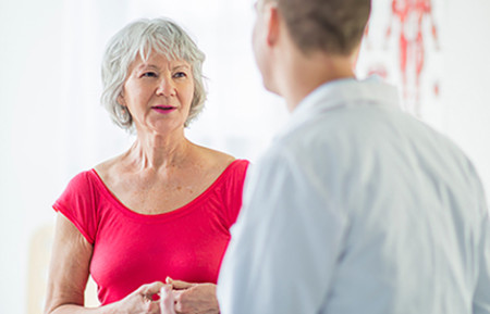 Older woman consulting a dermatologist