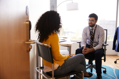 Doctors talking to patient