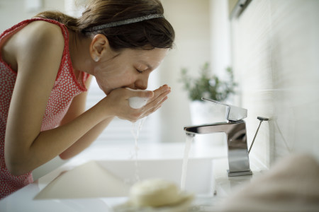 woman washing face