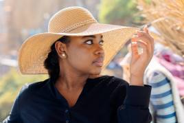 Photo of a person wearing sun-protective clothing