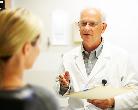 doctor talking to patient