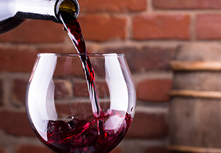 wine being poured into glass