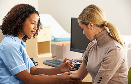 Woman getting vaccine