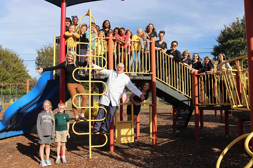 AAD member Dr. Joy Chastain at the playground for the Athens, Georgia YMCA for the shade structure dedication ceremony.