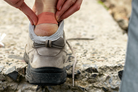 Bandage on back of heel from a blister