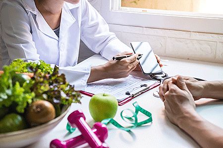 Healthy foods, measuring tape on dermatologist’s desk