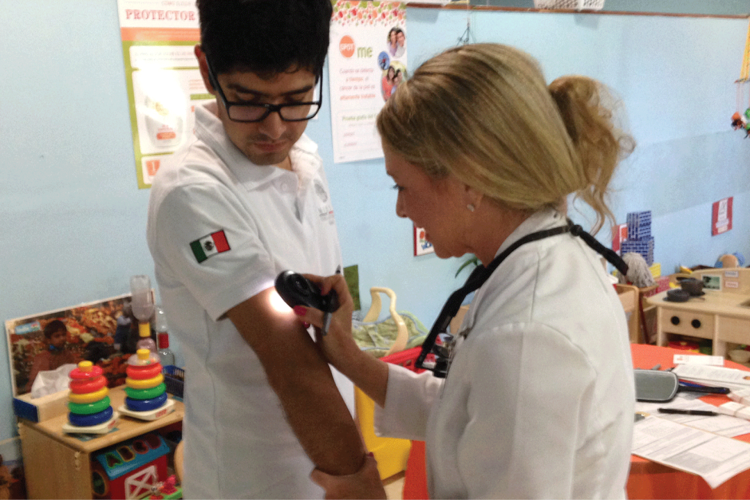 Dermatologist performing a skin exam