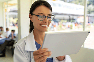 Doctor using a tablet computer.